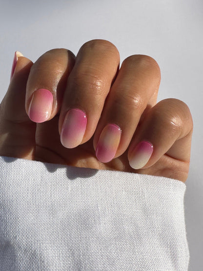 Semicured gel stickers with a sorbet design featuring swirls of pink, orange, and white colors.